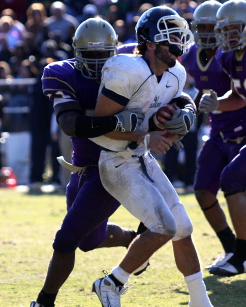 Bethel's Will Henry delivers a cruching blow to Lambuth QB Josh Garza almost dislodging his helmet.